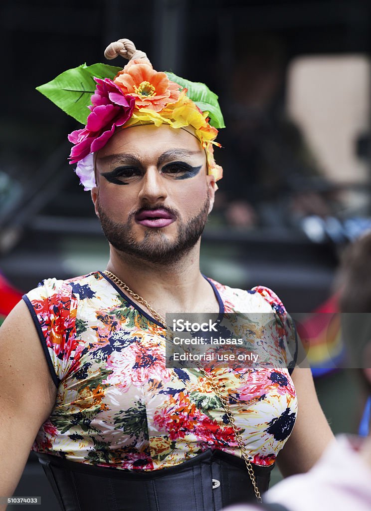 Gay man in womans dress, Pride 2014 Copenhagen. Copenhagen, Denmark - August 30, 2014: Gay man in womans dress, Gay Pride 2014 Copenhagen. Copenhagen Pride is held every year in August with the big parade on a Saturday for gays, lesbians, transsexuals and bisexuals. 2014 Stock Photo