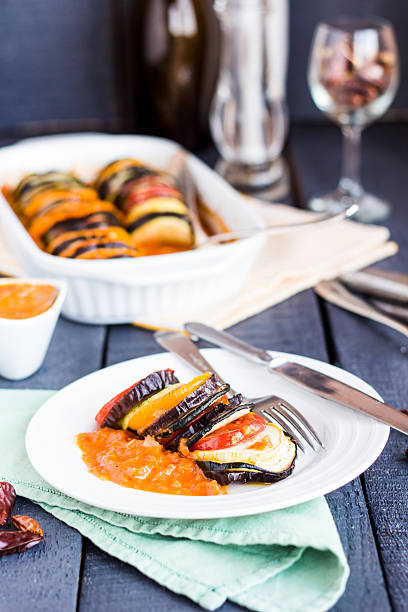 istock vegetable ratatouille on a plate with sauce, vertically 510376017