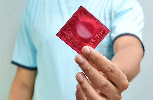 コンドーム - condom contraceptive sensuality healthcare and medicine ストックフォトと画像