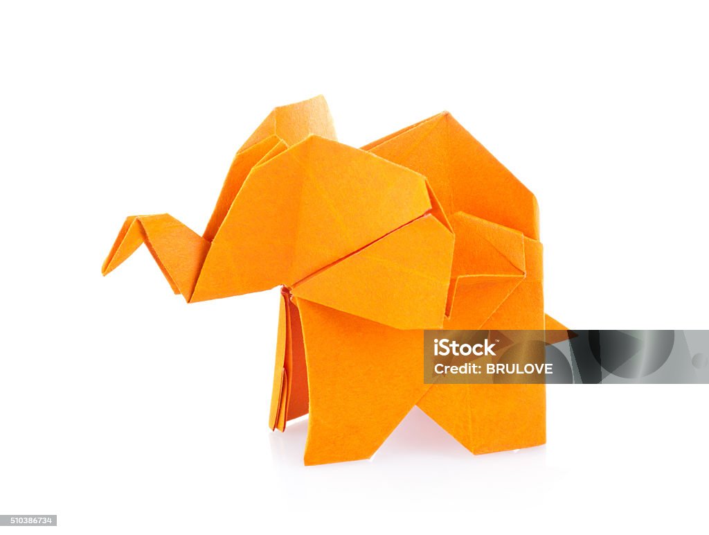 Orange elephant of origami Orange elephant of origami. Isolated on white background Origami Stock Photo