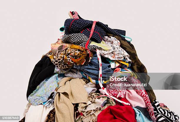 Big Pile Of Clothes And Accessories Thrown On The Floor Stock Photo - Download Image Now