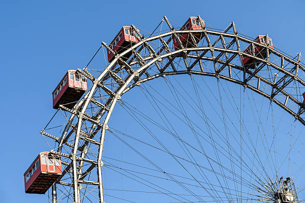 istock Fun Park Ferris Wheel Against Blue Sky 510390804
