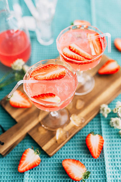 istock Pink summer cocktail drink from above with strawberries 510392208