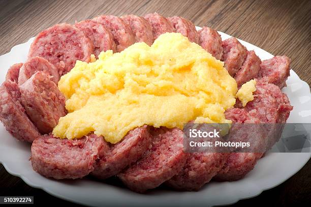 Cotechino With Polenta Stock Photo - Download Image Now - 30-34 Years, Animal Body Part, Boiled