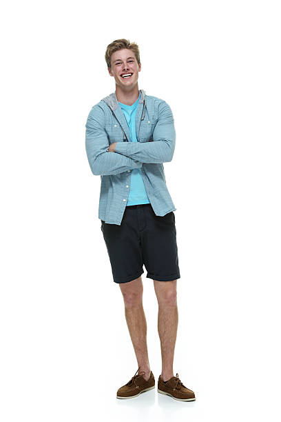 istock Cheerful man standing with arms crossed 510392837