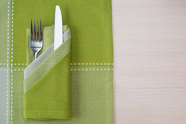 istock green napkin knife and fork 510393020
