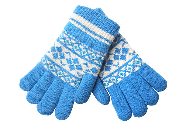 Warm woolen knitted gloves isolated on white background