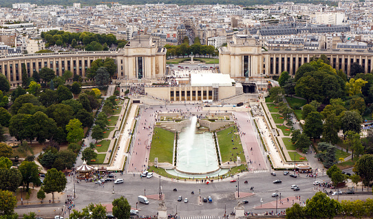 Color DSLR wide angle stock image of famous landmark Trocadero and the Palais de Chaillot shot from above at the Eiffel Tower, Paris, France. Horizontal with city skyline and copy space for text.