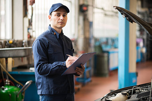 istock Mechanic at work in his garage 510396056