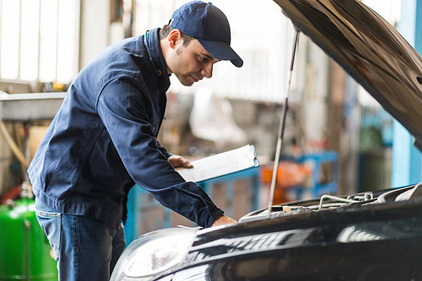 istock Mechanic at work in his garage 510396118