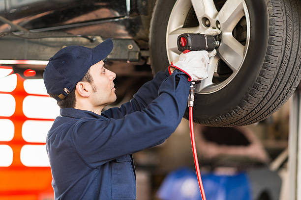 istock Mechanic at work in his garage 510396228