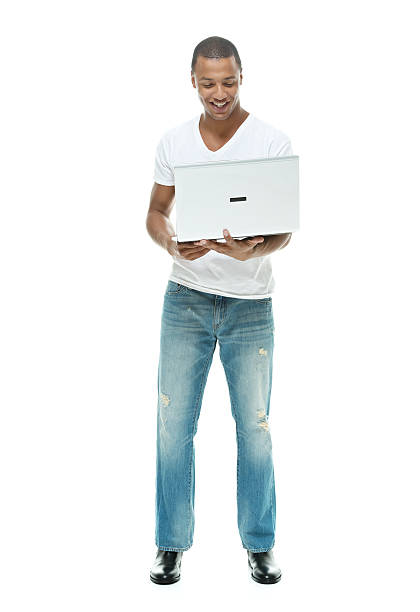istock Smiling casual man holding laptop & working 510396805