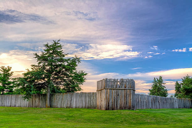Fort Kearny log fence at sunrise Sunrise over a military fort in Kearny Nebraska kearney county stock pictures, royalty-free photos & images