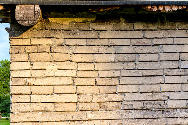 Brick stone wall of an old rustic cabin Wall made of stone at an old military fort in Nebraska kearney county stock pictures, royalty-free photos & images