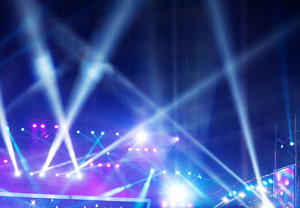 multiple spotlights on a theatre stage lighting rig stock photo