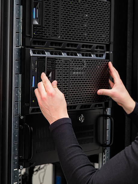 istock Colse-up of a IT consultant installing server in datacenter 510398802