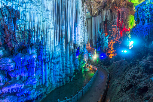 Yongshuo, Guanxi, China - December 19, 2015: The beautiful Yinziyan cave streches over 2km and goes through 12 mountains. Its insisde temperature is a constant 26 degrees Centigrade over the year at a 100% humidity.