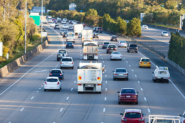 Busy highway Busy australian highway at peak hour traffic car traffic jam uk stock pictures, royalty-free photos & images