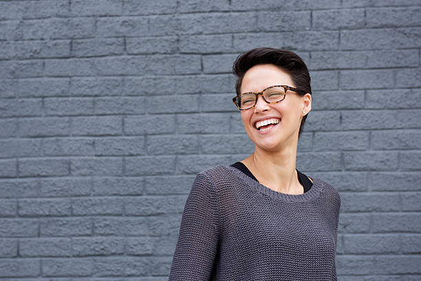 istock Beautiful mixed race woman laughing with glasses 510399734