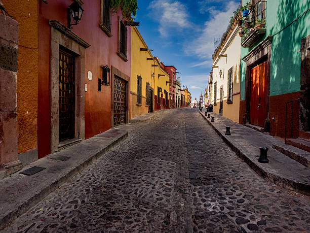Quiet Backstreet in San Miguel de Allende The many backstreets of San Miguel de Allende in Mexico can be quiet, colorful and beautifully preserved. A wonderful serene place for a morning or evening walk. mexico street scene stock pictures, royalty-free photos & images