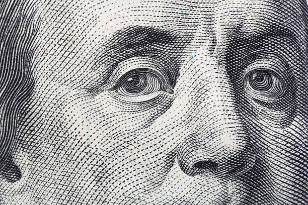 istock Close view of Benjamin Franklin hundred dollar bill 510401018