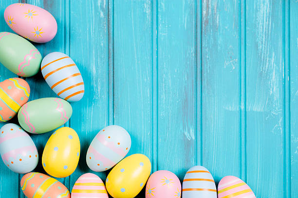 istock Easter eggs on blue wood. Seasonal background frame. 510404746