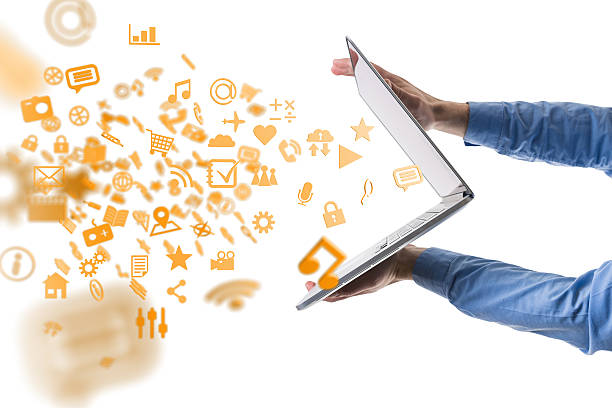 Apps, media and other information flying out of a notebook