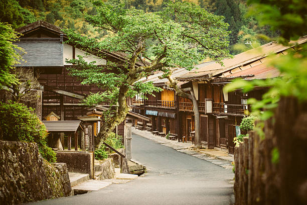 Tsumago a Traditional Japanese Village in the Mountains Tsumago a traditional Japanese village in the Gifu prefecture Mountains. Japan. tokai region photos stock pictures, royalty-free photos & images