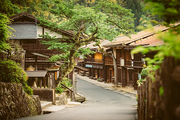 Tsumago a Traditional Japanese Village in the Mountains Tsumago a traditional Japanese village in the Gifu prefecture Mountains. Japan. mt ontake stock pictures, royalty-free photos & images