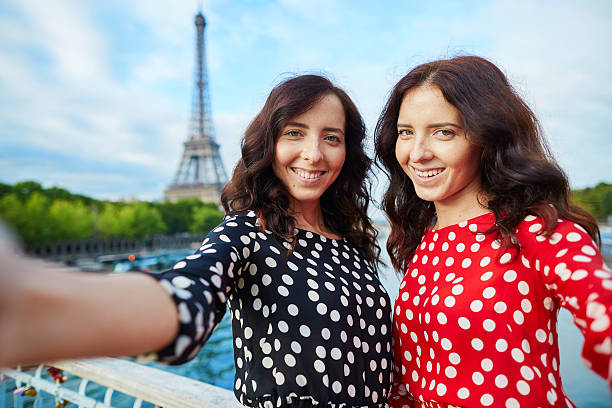 istock Beautiful twin sisters taking selfie 510406726