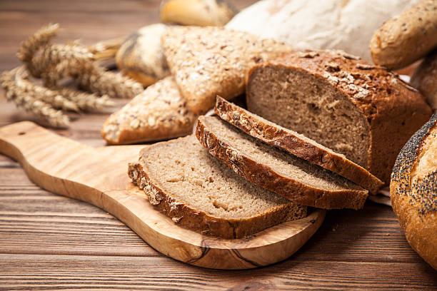 istock Bread assortment on wooden surface 510408242