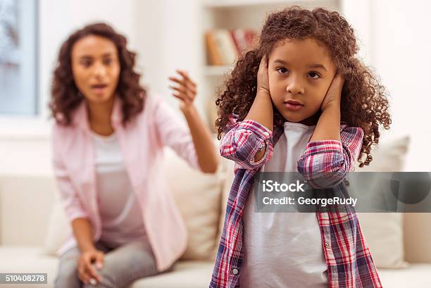 Mother And Daughter Stock Photo - Download Image Now - Child, Mother, Scolding