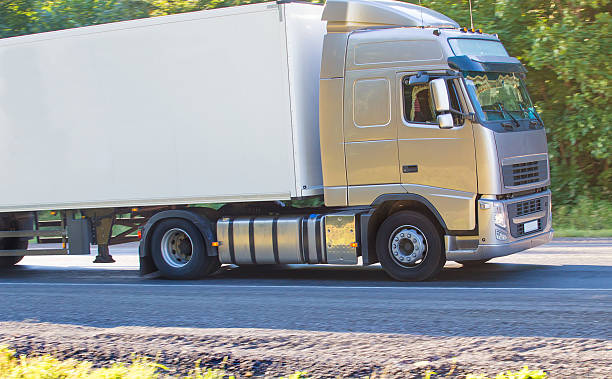 istock truck goes on the highway 510408292