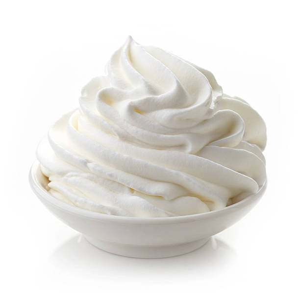 bowl of whipped cream bowl of whipped cream isolated on white background whipped food stock pictures, royalty-free photos & images