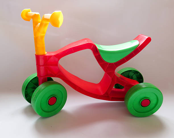 istock green plastic with red tricycle on white background 510410306
