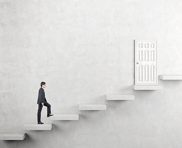 istock Climbing a ladder of success 510410794