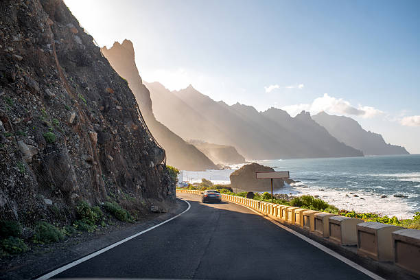 Coastline near Tagana village on Tenerife island Beautiful landscape view on the road and rocky coastline near Taganana village in northeastern part of Tenerife island, Spain tenerife stock pictures, royalty-free photos & images