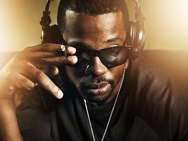 istock dj smoking and wearing sunglasses 510411827