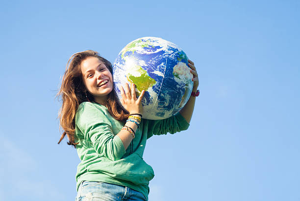 Child dmbracing the world