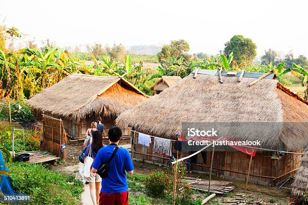 Tourists Entering Village Of Hill Tribes Stock Photo - Download Image Now - Chiang Mai Province, Village, Architecture
