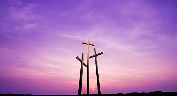 Three crosses on the mountain Golgotha representing the day of Christâs crucifixion