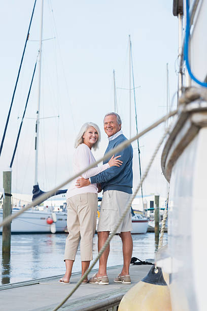 istock Happy senior couple enjoying harbor view 510414388