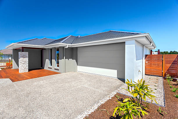 istock Modern house with a garage and backyard area 510414480