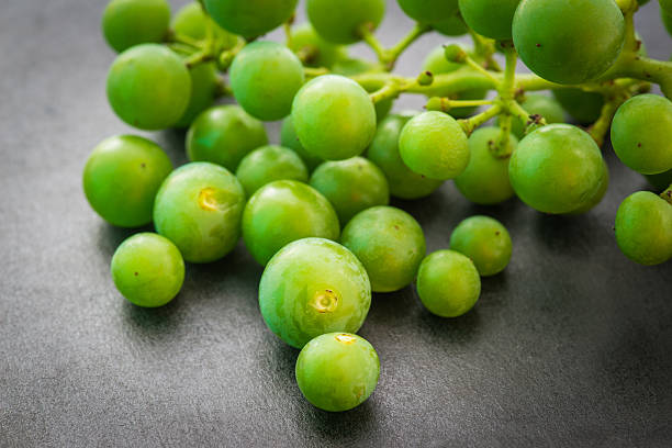 istock Unripe green grapes. 510416167