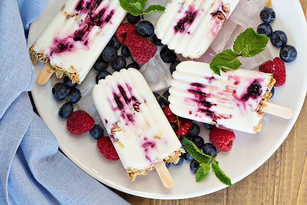 istock Frozen yogurt popsicles with oats and jam 510416361