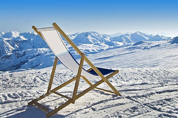 istock Empty deckchair on the side of a ski slope 510417459