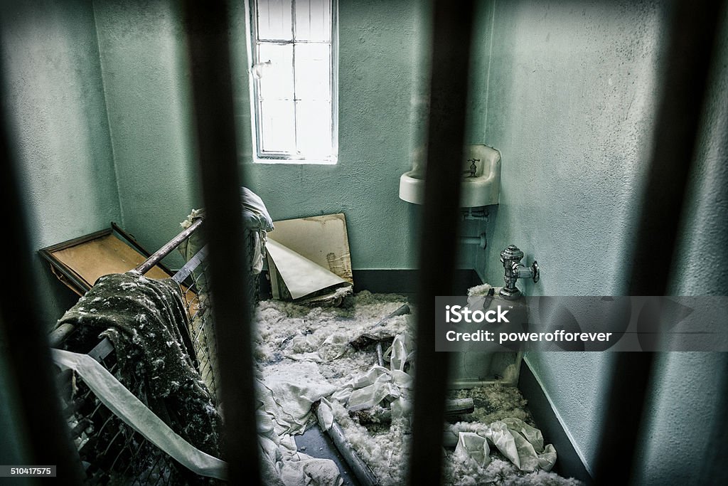 Trashed Jail Cell Trashed jail cell from prison riot. Prison Stock Photo