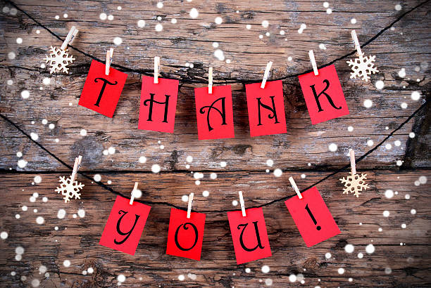 Thank You Tags on a Line in the Snow stock photo