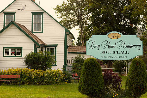 Lucy Maud Montgomery Birthplace in Prince Edward Island New London, Prince Edward Island, Canada - July 8, 2014: Lucy Maud Montgomery Birthplace in New London in Prince Edward Island in Canada. The house is a modest, white cottage with green trim located about 11 km southwest of Cavendish. lucy maud montgomery photos stock pictures, royalty-free photos & images