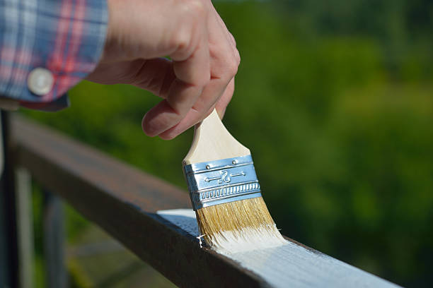 istock Man painting a guardrail 510439145